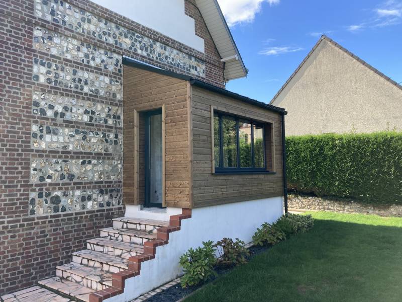 Faire installer un sas d'entrée en bois sur fontaine la mallet