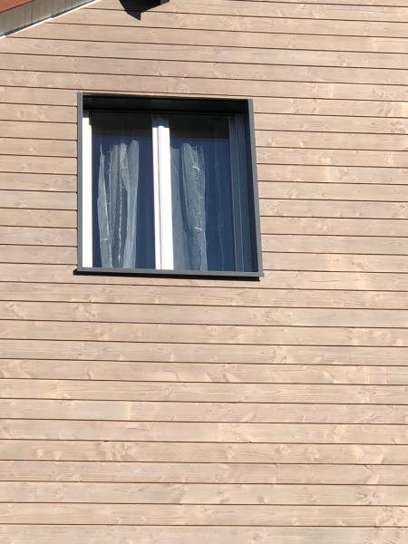 poser un bardage douglas sur sa façade sur Octeville-sur-mer