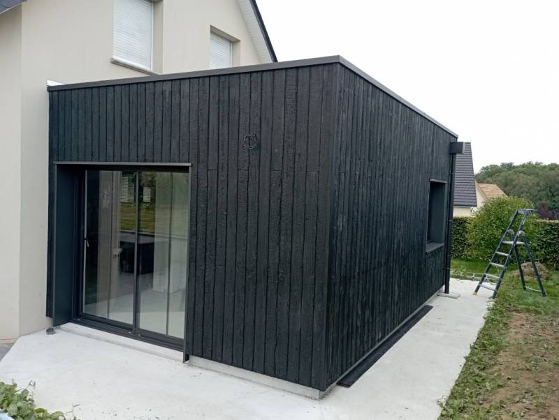 Installer une extension bois sur sa maison près de la Frenaye